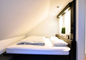 Modern and cozy studio in a former coach house