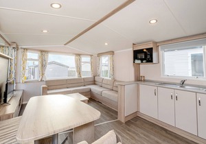 Modern and spacious 12ft-wide caravan with one double and two twin.