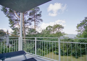 Modern vacation apartment with fireplace, balcony - Ferienresidenz Zwei Bodden FeWo111