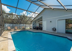 Naples Park Paradise with salt water heated pool.