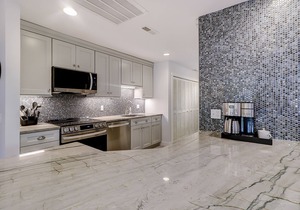 Newly remodeled dog-friendly island sanctuary with pool, deck, & lagoon view