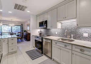 Newly remodeled dog-friendly island sanctuary with pool, deck, & lagoon view