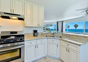 Oceanfront condo across street from beach with amazing views & walkable location