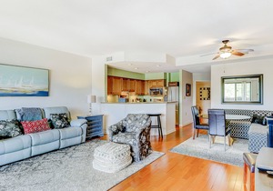 Penthouse living at Shelter Cove Marina with balcony, harbor view, pool & tennis