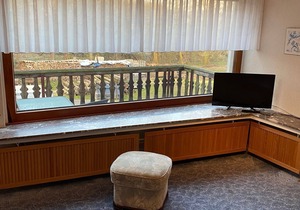 Room with king-size bed and balcony
