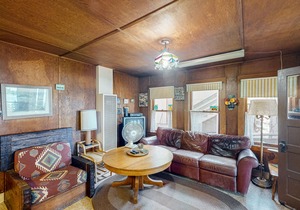 Rustic, lakefront cabin with private dock, beach, screened porch & great view