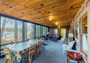 Rustic, lakefront cabin with private dock, beach, screened porch & great view