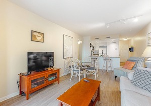 Second-Floor Condo w/Private Covered Balcony, Views, Free WiFi, and Shared Pool