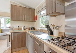 Shepherd’s Hut with an open plan design with king-size bed.