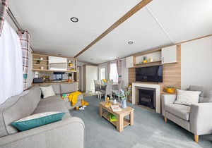 Spacious and modern 12ft-wide caravan with one double and two twin.