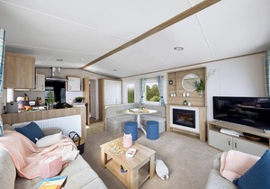 Spacious and modern 12ft-wide caravan with one double and two twin.