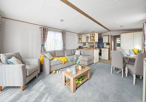 Spacious and modern 12ft-wide caravan with one double and two twin.