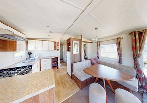 Spacious and well-presented 12ft-wide caravan with one double and one twin.
