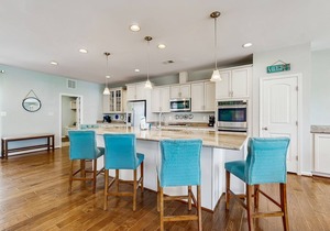 Spacious townhouse near Bethany Beach with community pool, patio, & firepit