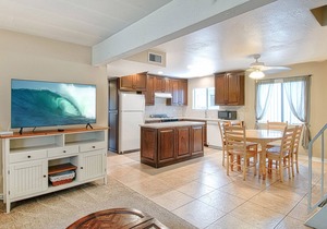Spacious upper rear unit in an oceanfront triplex just steps from the Balboa Pier fun!