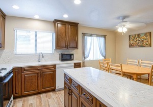 Spacious upper rear unit in an oceanfront triplex just steps from the Balboa Pier fun!