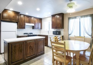 Spacious upper rear unit in an oceanfront triplex just steps from the Balboa Pier fun!