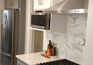 Steps to the beach and shopping/dining. Spanish-style house with updated kitchen