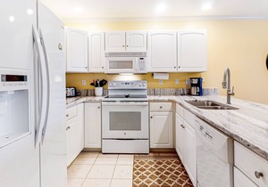 Sunny condo w/balcony, water views, shared outdoor pool + kiddie pool