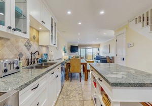 Sunny & serene, two-story, oceanfront condo w/a shared, heated pool & free WiFi