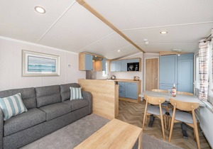 Super 12ft-wide luxurious caravan with one double and two twin.
