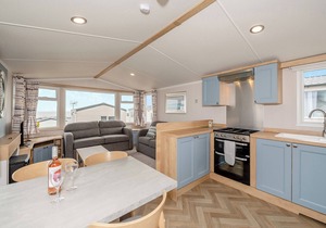 Super 12ft-wide luxurious caravan with one double and two twin.