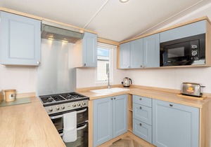 Super 12ft-wide luxurious caravan with one double and two twin.