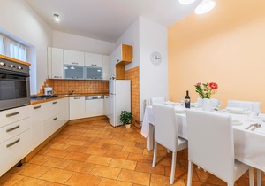 This charming vacation apartment is located on the first floor of a family house.