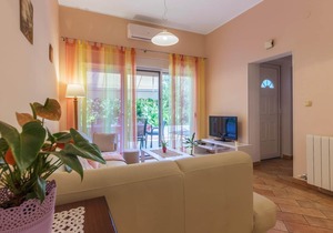 This charming vacation apartment is located on the first floor of a family house.
