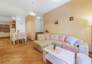 This charming vacation apartment is located on the first floor of a family house.