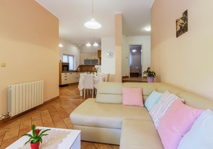 This charming vacation apartment is located on the first floor of a family house.