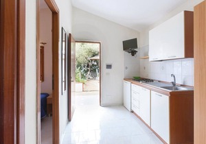 This modern bungalow belongs to a vacation home complex directly above the sea, with a unique panora