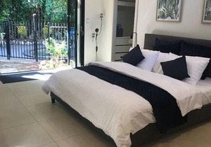 Tropical sanctuary surrounded by Balinese inspired gardens