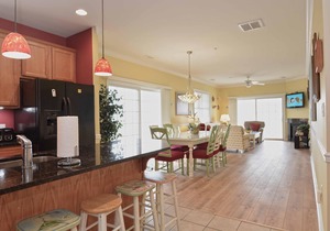 Unique, festive 3-bedroom luxury condo with adorable coastal decor and free WiFi located downtown on the bayside and just two blocks to the beach and Boardwalk!