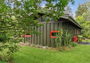 Visit this charming wooden house surrounded by wonderful nature.