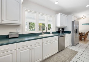 Walk to the Beach from this renovated home with new pool!