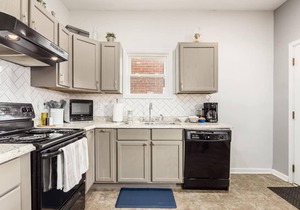 Walkable 1900s Townhome | Free Parking + Pets OK