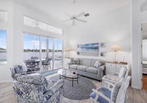 Waterfront home with views, pool and walk to beach