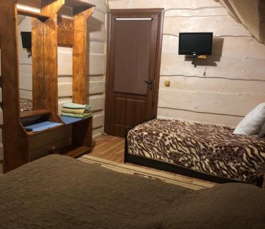 Podobovets House | Біля комори