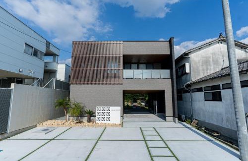 Nishi Ward Apartment | みらいステイKAWACHI サウナspaや温泉付き-絶景オーシャンビューを満喫