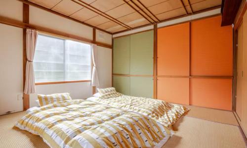 Shiraoi House | 一軒家まるごと貸切宿Woodウッド