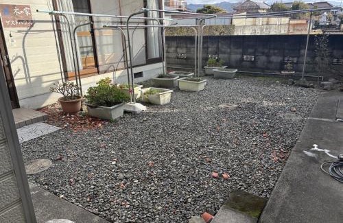 Hoshinooka House | 木の家ゲストハウス松山本館