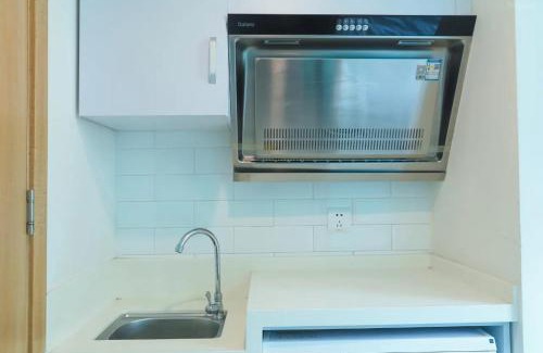 East Huanshi Road Apartment | 禧盈酒店
