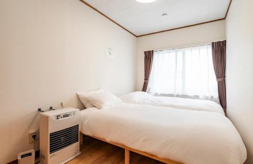 Otaru Villa | 雪の郷-YUKI no SATO フルリフォーム 小樽の閑静な住宅地