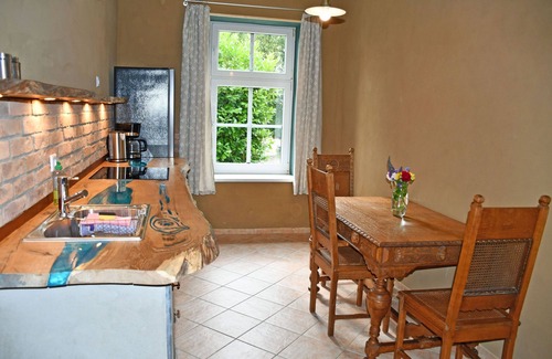 Ralswiek Apartment | 07 Muttland vacation apartment with fireplace - vacation apartments in the Gnies manor house