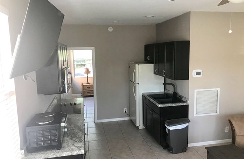 Hunt Club Apartment | 1/1 pool & tiki hut near Wellington Equestrian washer dryer access stores close