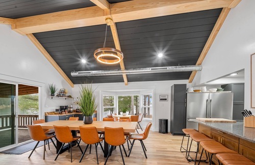 Evart House | 1/2 acre, 450 feet of lake frontage and a sandy beach with sunsets!