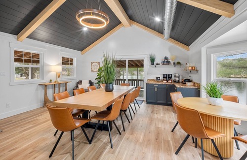 Evart House | 1/2 acre, 450 feet of lake frontage and a sandy beach with sunsets!