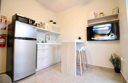 Mayaguez Pueblo Apartment | 1.3 Cozy Scandinavian Apt with Generator