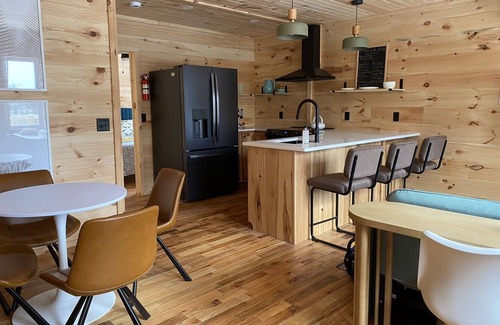 Amery Cabin | 1 Bdr Cabin unit Respite on Apple River. Kayaks, SUPs, and more! Pet friendly!